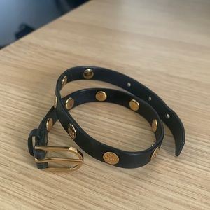 Lightly used Tory Burch black leather wrap bracelet with gold detailing.